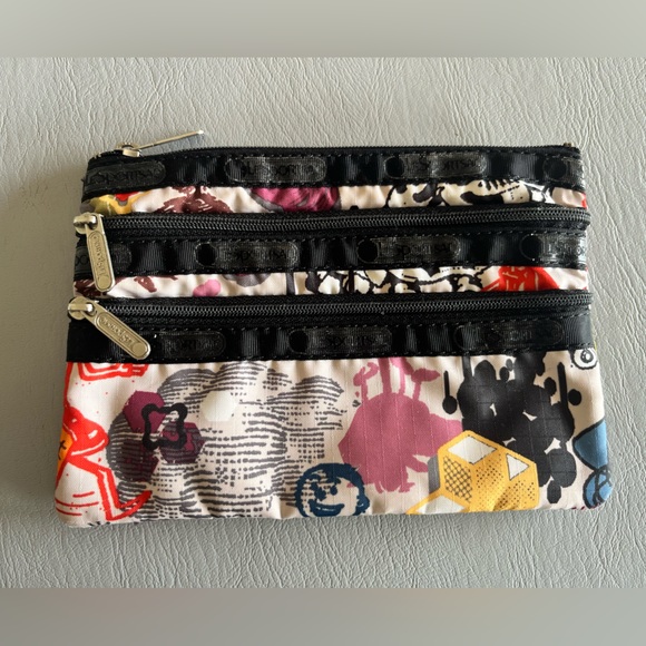 Lesportsac Handbags - Lesportsac 3-zip cosmetic bag